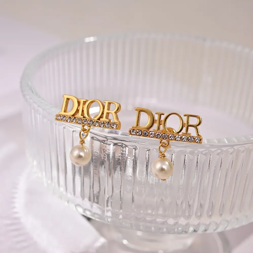 Dior Dio(r)evolution Earrings Gold-Finish Metal with White Resin Pearls and Silver for Women in Tone Crystals Dior Dio(r)evolution Earrings Gold-Finish Metal with White Resin Pearls and Silver for Women in Tone Crystals