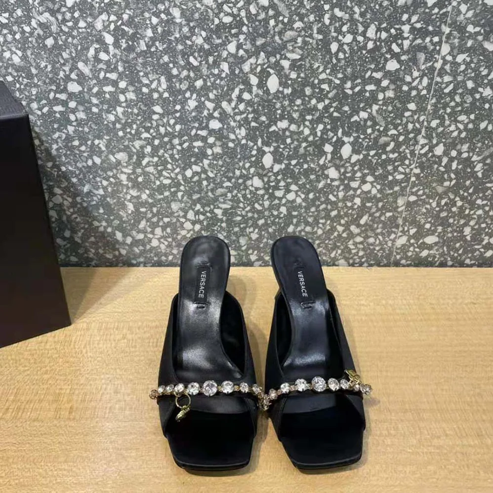Versace Artifact Mid-Heel Mules for Women in Black Versace Artifact Mid-Heel Mules for Women in Black