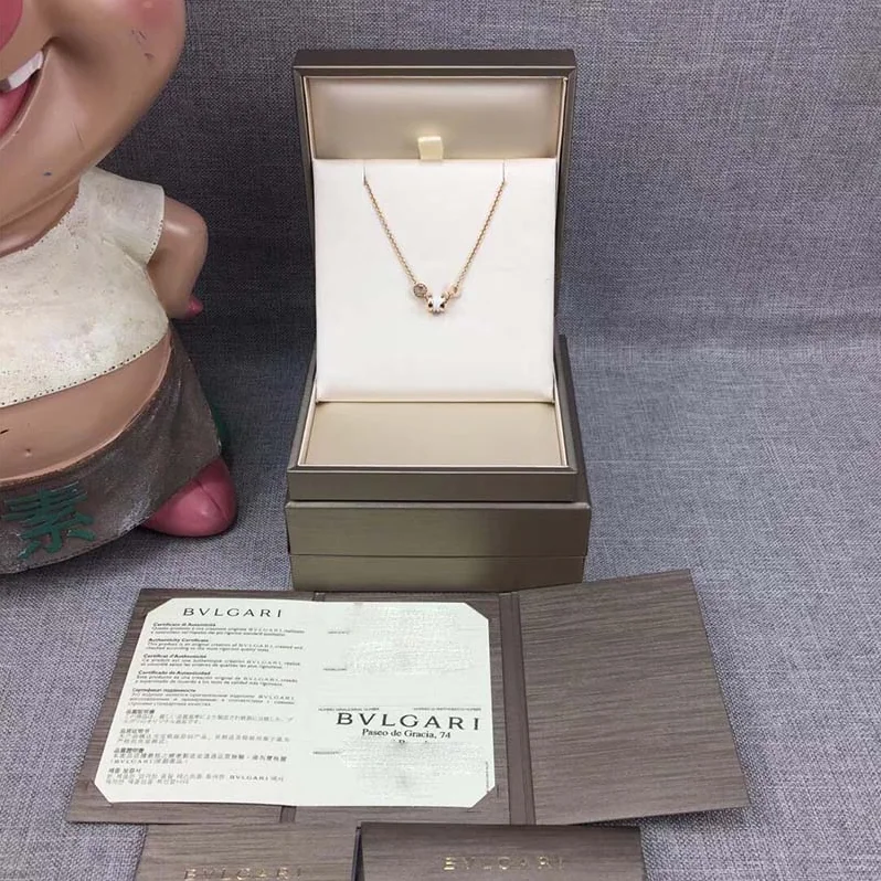 Bvlgari B.zero1 Soft Bracelet in 18 KT Rose Gold with 18 KT Rose Gold and White Ceramic Pendant for Women
