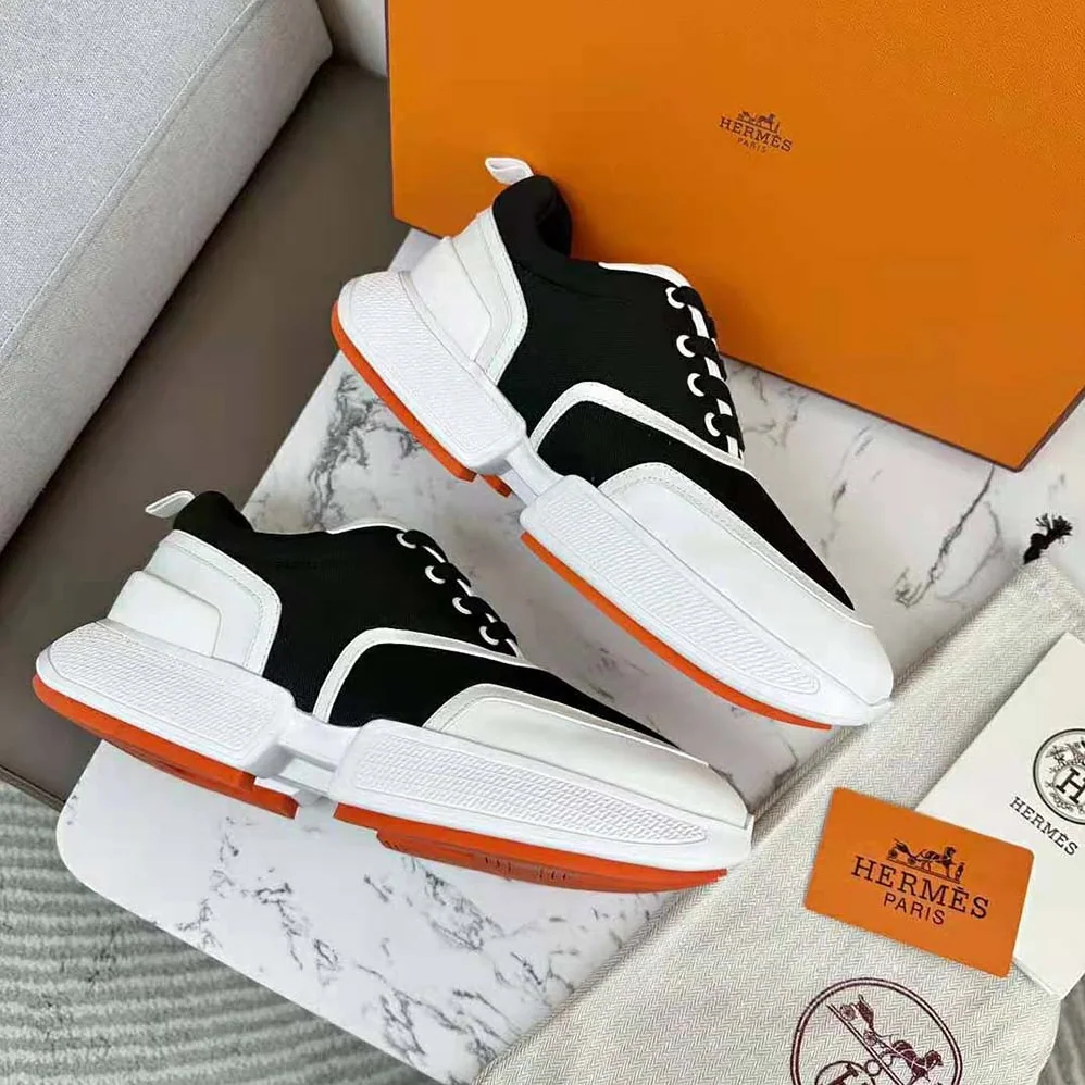 Hermes Giga Sneaker in Mesh Pique and Calfskin for Women in Black Hermes Giga Sneaker in Mesh Pique and Calfskin for Women in Black