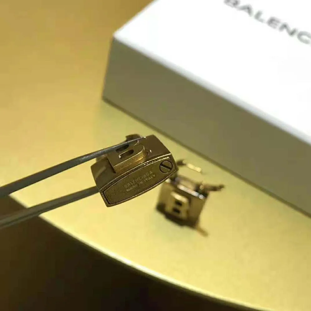 Balenciaga Lock Small Earrings in Aged for Women in Gold Brass Balenciaga Lock Small Earrings in Aged for Women in Gold Brass
