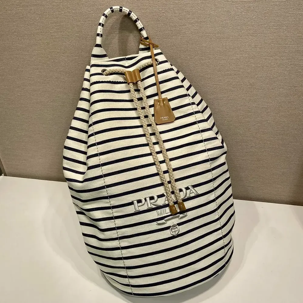 Prada Striped Canvas Drawstring Duffel Bag for Unisex in White