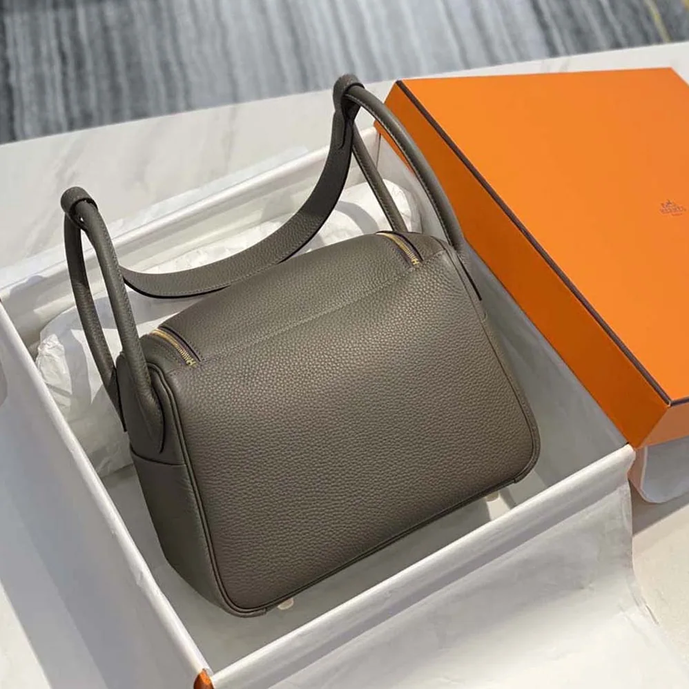 Hermes Lindy 26 in Clemence Leather for Women in Gray/Gold Hermes Lindy 26 in Clemence Leather for Women in Gray/Gold
