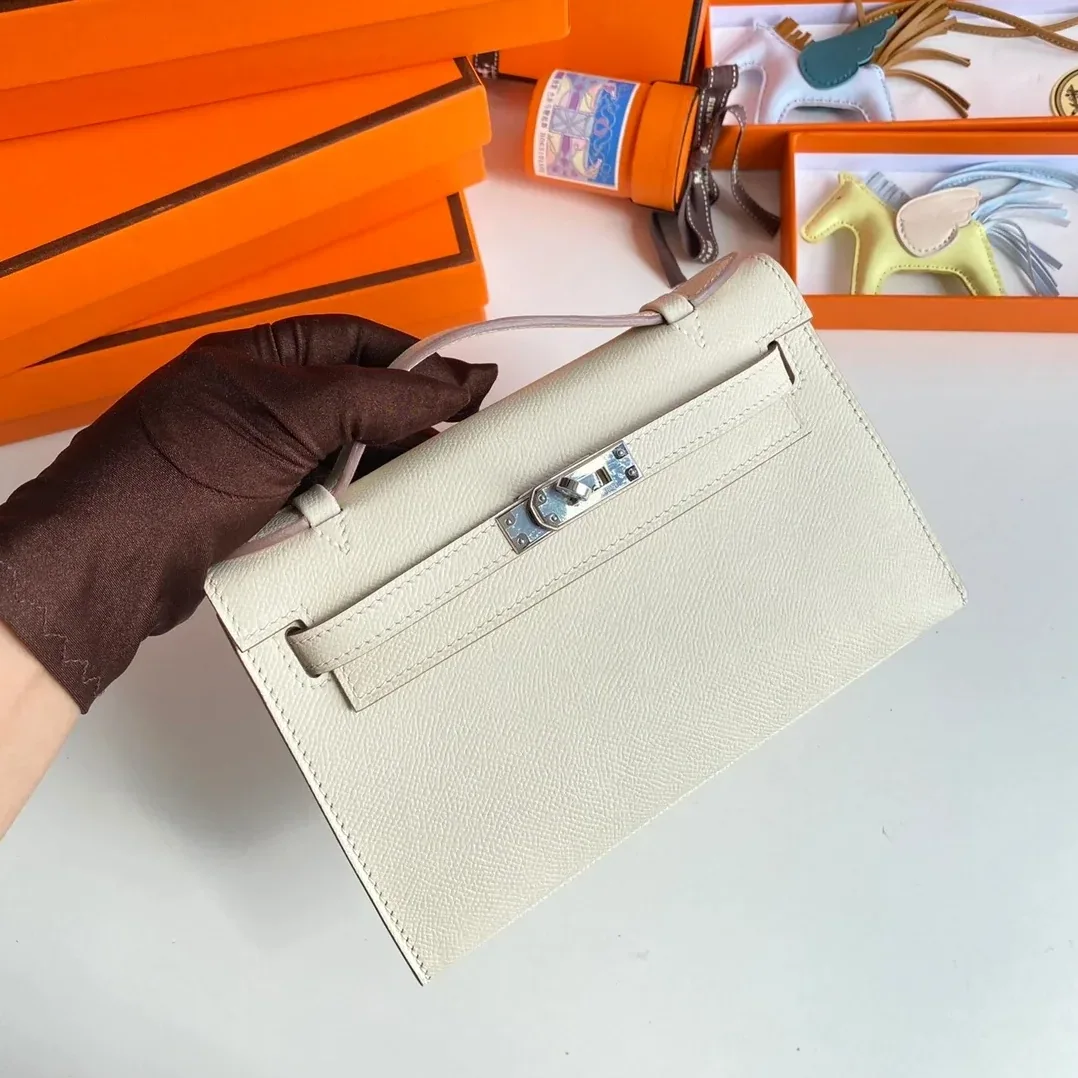 Hermes Kelly Pochette Top Handle Bag in Blanc Epsom Palladium Hardware