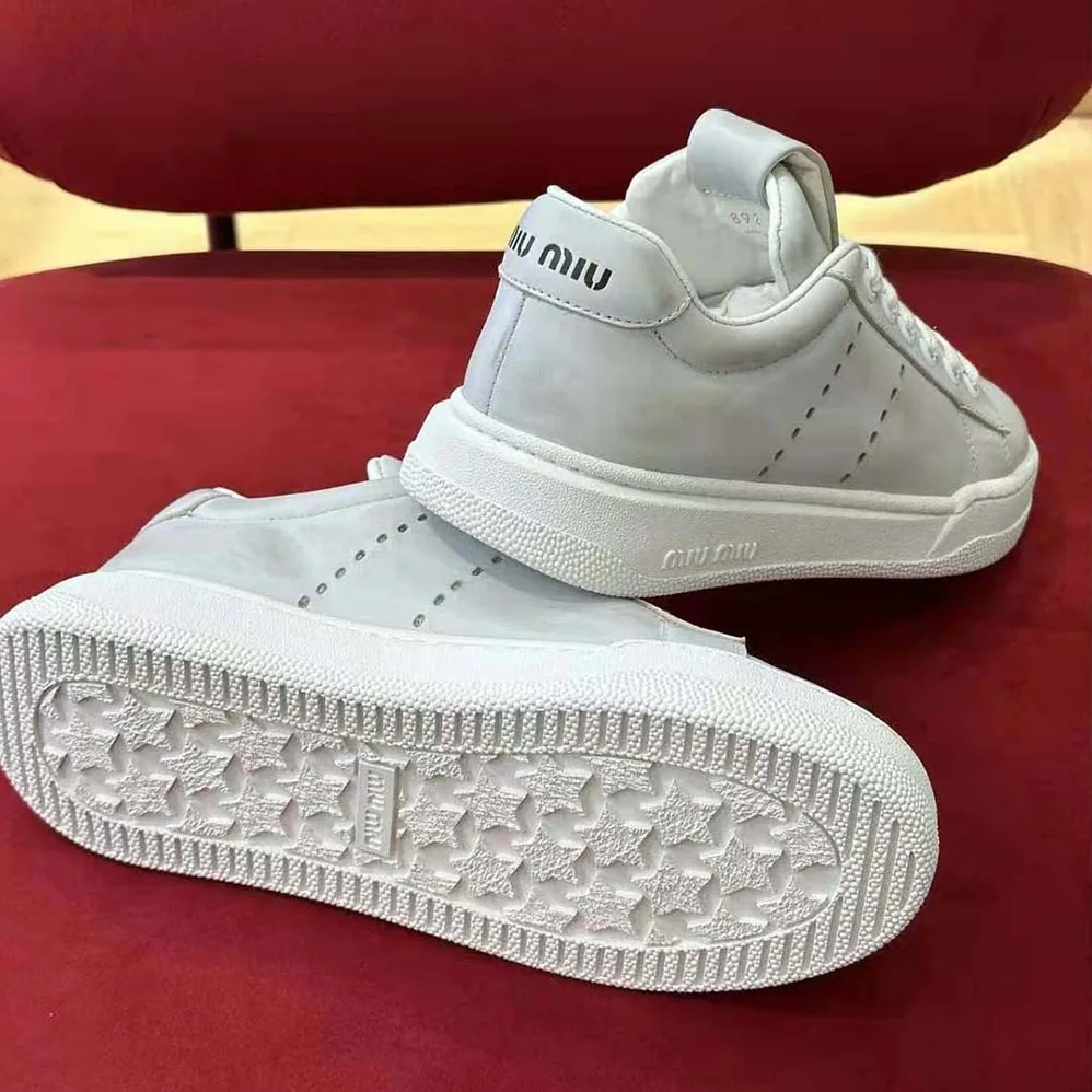 Miu Miu Bleached Leather Sneakers for Women in White