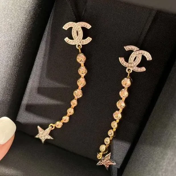 Chanel Long Star Earrings Gold Chanel Long Star Earrings Gold