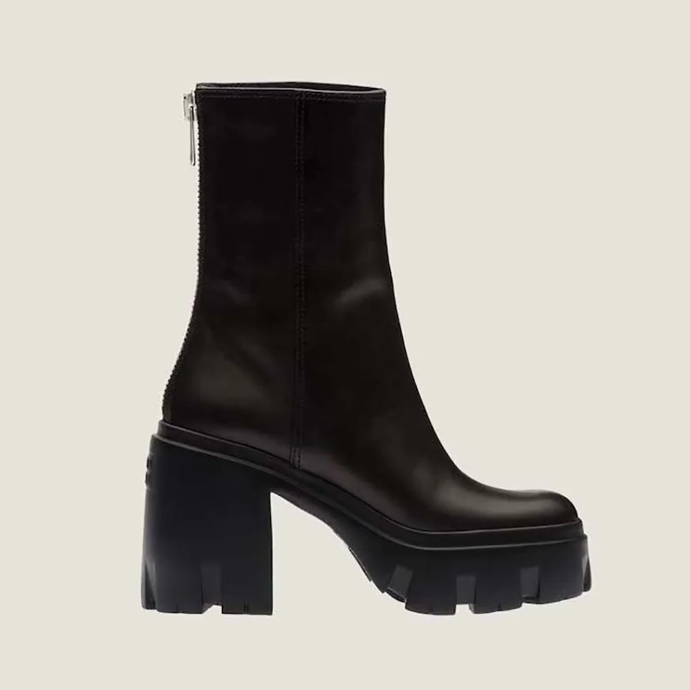 Miu Miu Leather Booties in EVA Sole with Logo for Women in Black Miu Miu Leather Booties in EVA Sole with Logo for Women in Black