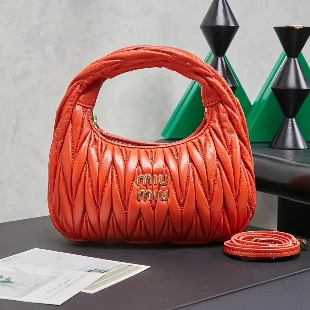 Miu Miu Wander Matelassé Nappa Leather Hobo Bag for Women in Orange Miu Miu Wander Matelassé Nappa Leather Hobo Bag for Women in Orange