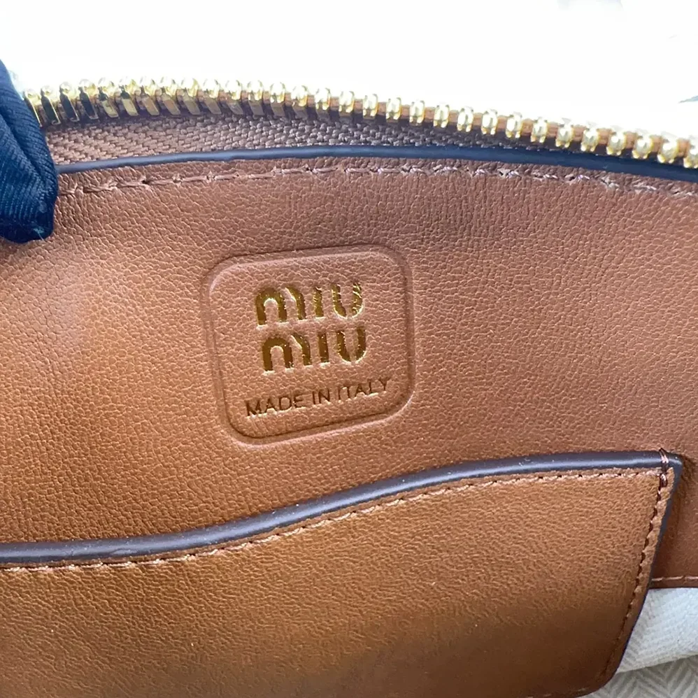 Miu Miu Aventure Nappa Leather Top-handle Bag for Women in Brown Miu Miu Aventure Nappa Leather Top-handle Bag for Women in Brown
