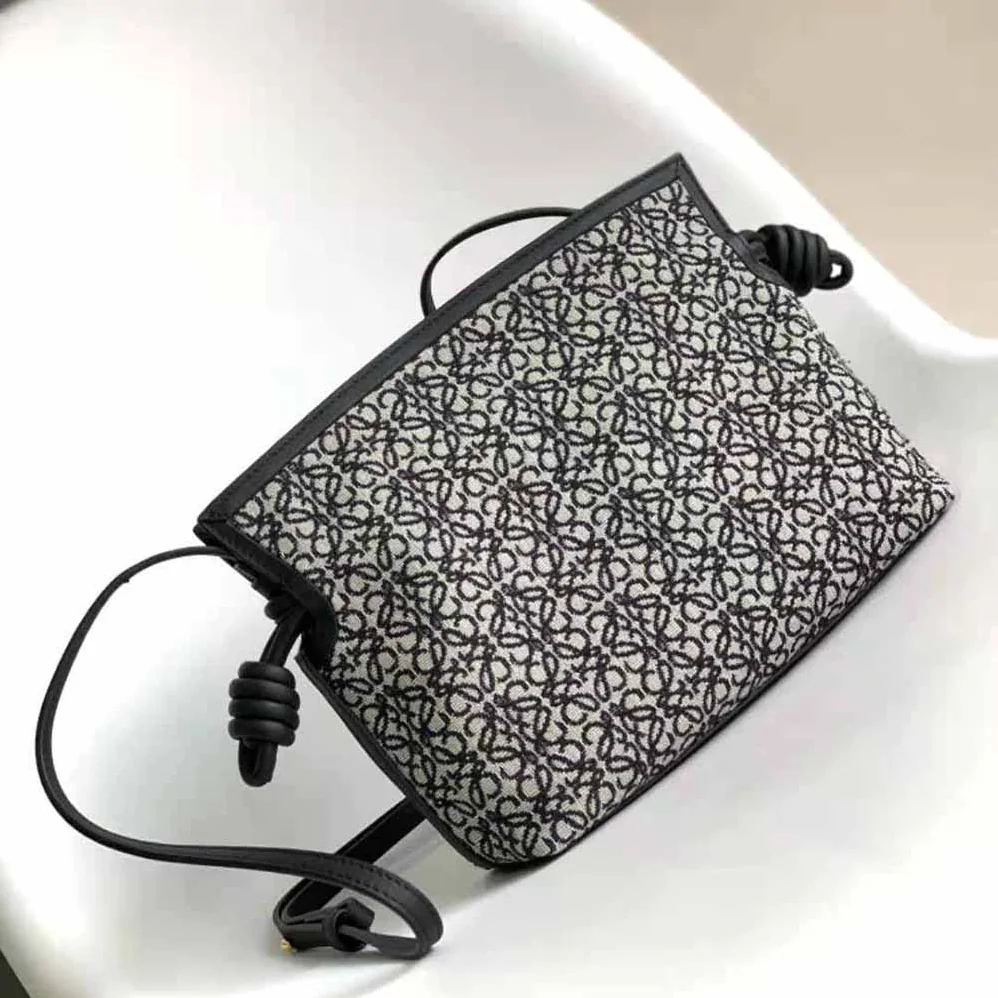 Loewe Mini Flamenco Clutch in Anagram Jacquard and Calfskin for Women in Black