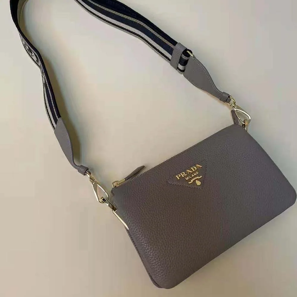 Prada Leather Shoulder Bag with Metal Lettering Logo for Women in Gray Prada Leather Shoulder Bag with Metal Lettering Logo for Women in Gray