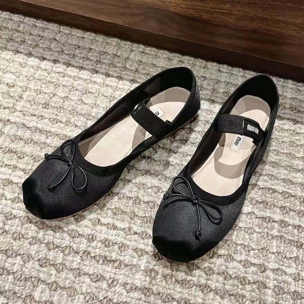 Miu Miu Satin Ballerinas with Knit Logo Label for Women in Black Miu Miu Satin Ballerinas with Knit Logo Label for Women in Black