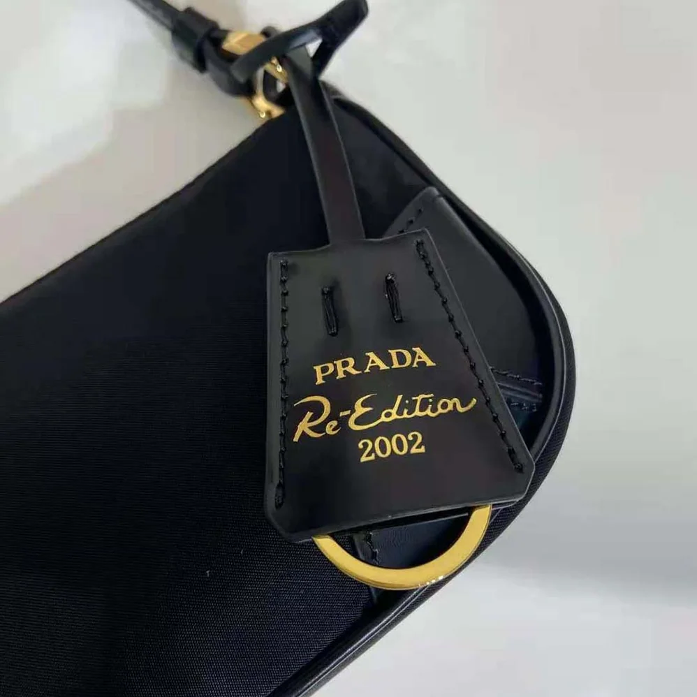 Prada Re-Edition 2002 Re-Nylon and Brushed Leather Shoulder Bag for Women in Black