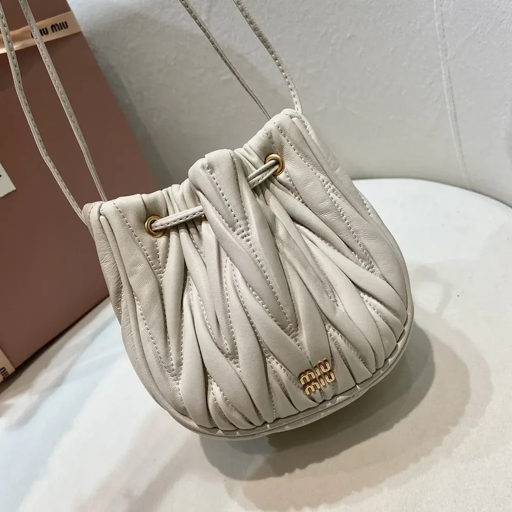 Miu Miu Matelassé Nappa Leather Pouch for Women in White Miu Miu Matelassé Nappa Leather Pouch for Women in White