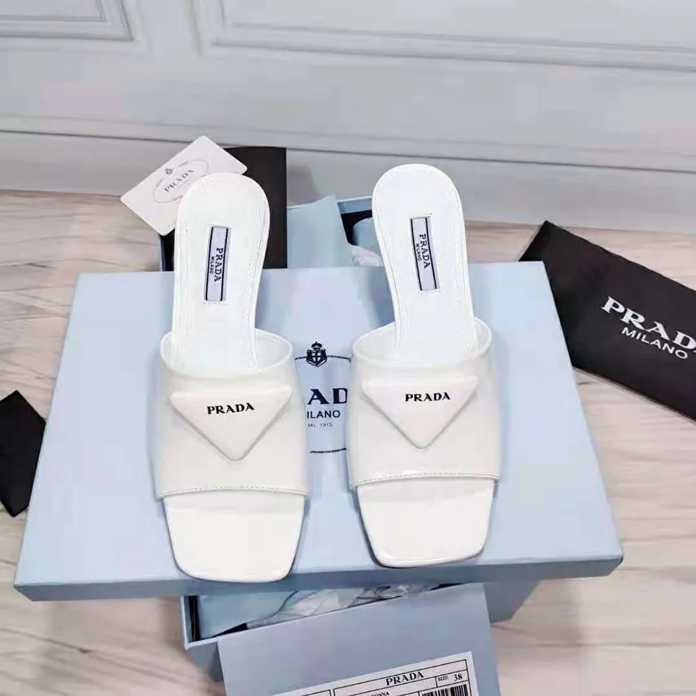Prada Brushed Leather Mid-heeled Slides in 65mm Heel for Women in White Prada Brushed Leather Mid-heeled Slides in 65mm Heel for Women in White