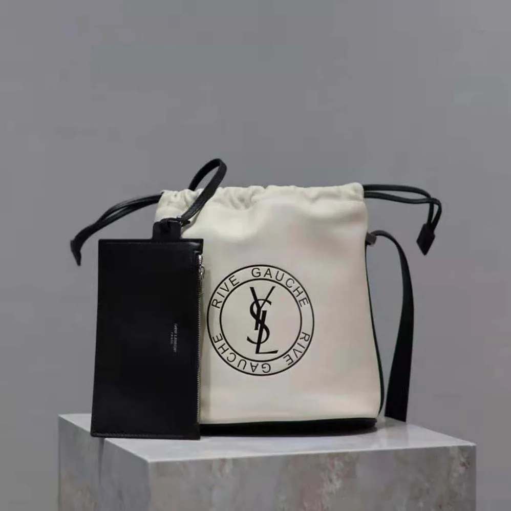 Saint Laurent YSL Rive Gauche Laced Bucket Bag in Smooth Leather for Men in Beige