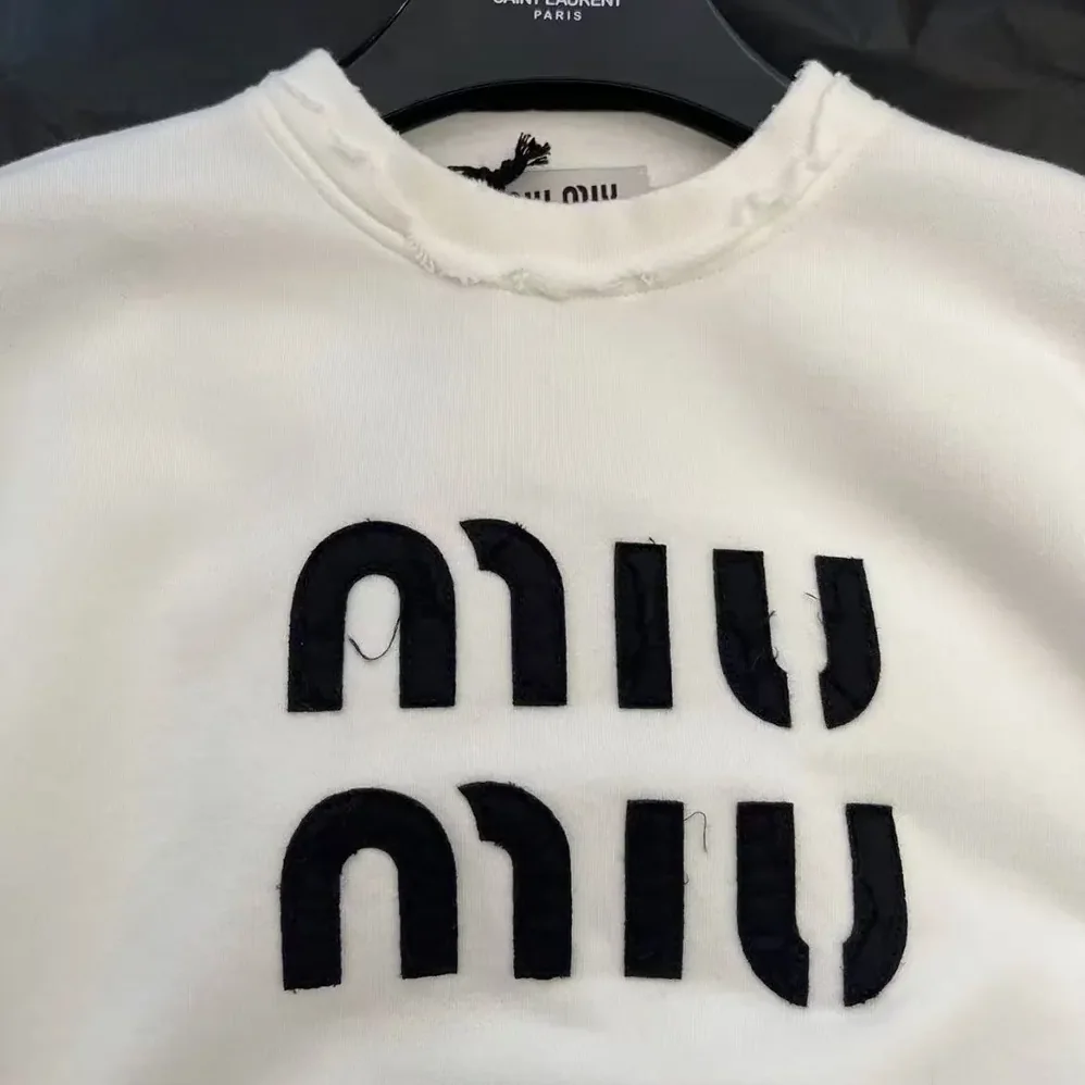 Miu Miu Logo-Embroidered Cotton Sweatshirt for Women in White Miu Miu Logo-Embroidered Cotton Sweatshirt for Women in White