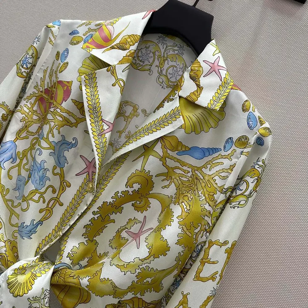 Versace Underwater Barocco Knotted Crop Silk Shirt for Women in Yellow Versace Underwater Barocco Knotted Crop Silk Shirt for Women in Yellow