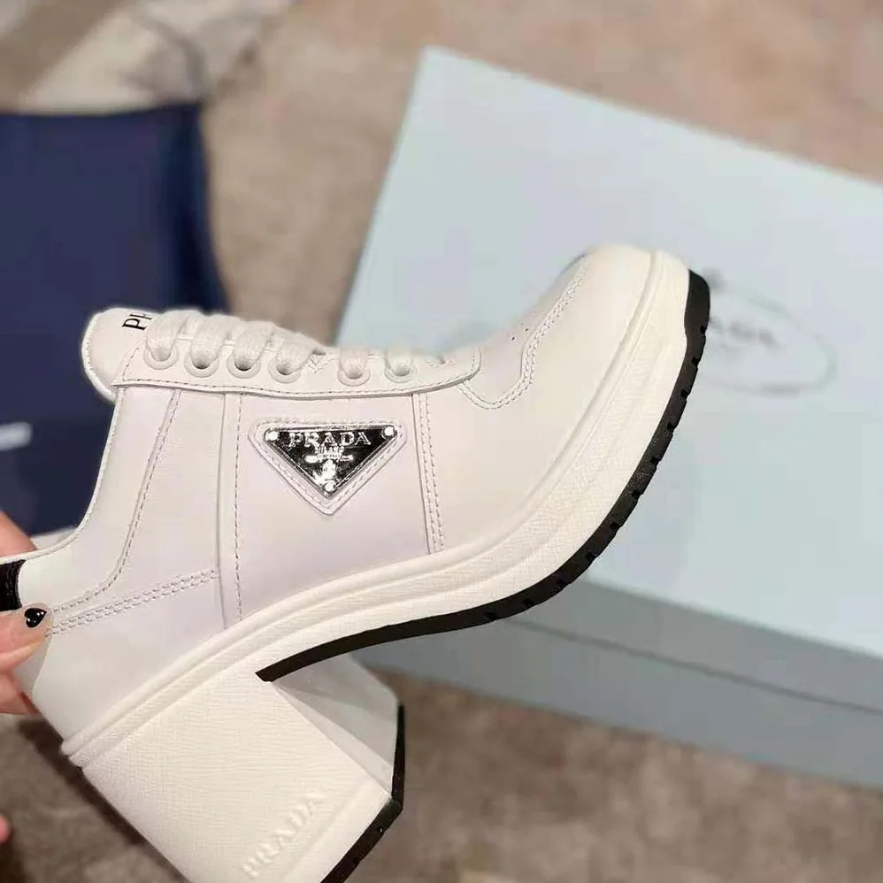 Prada Downtown High-Heeled Leather Sneakers for Women in White Prada Downtown High-Heeled Leather Sneakers for Women in White