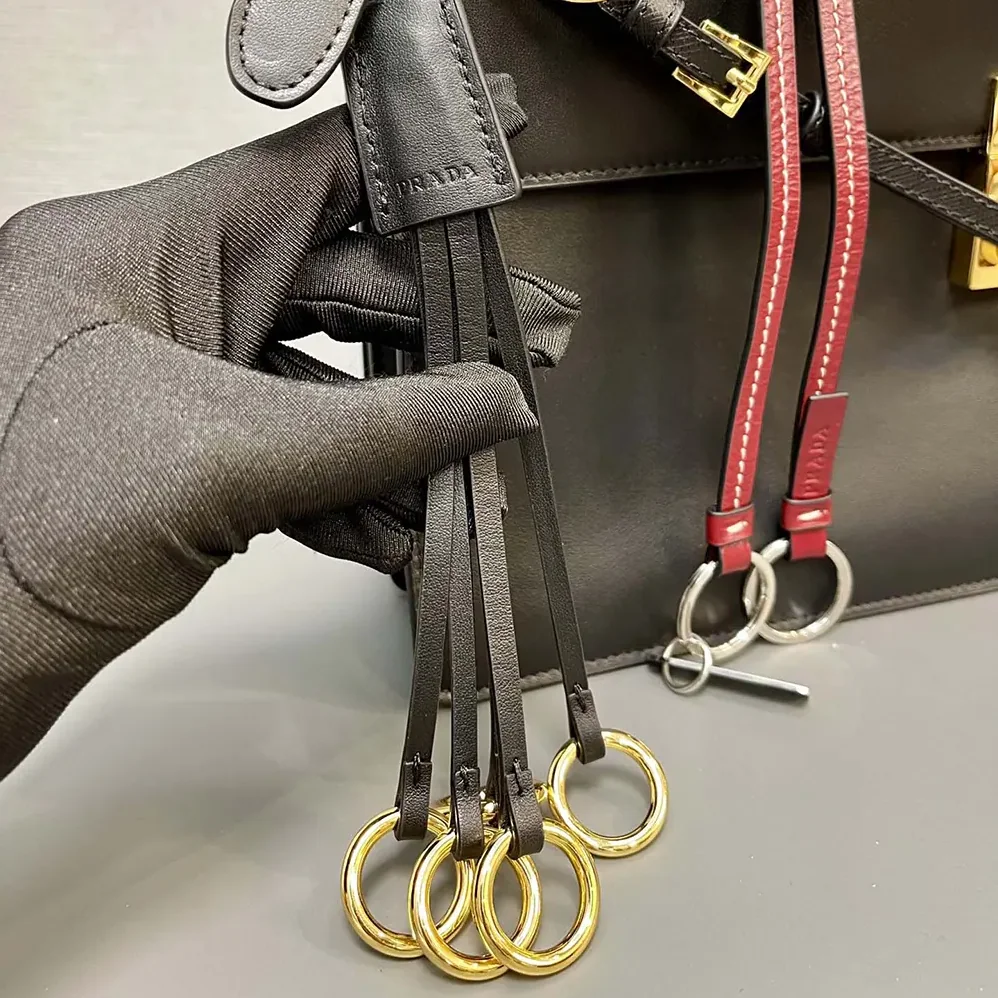 Prada Soft Sound Large Leather Shoulder Bag with Charms for Women in Black