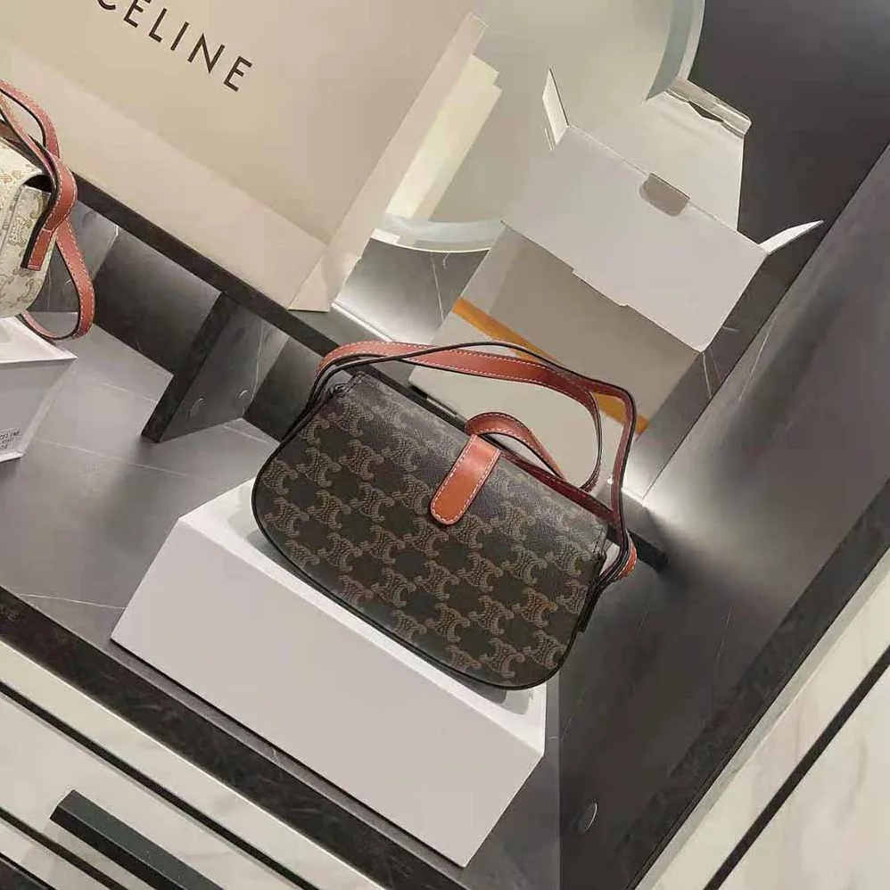 Celine Clutch on Strap in Triomphe Canvas and Calfskin for Women