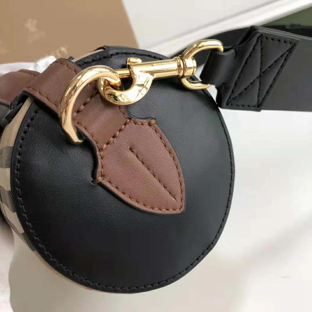 Burberry The Icon Stripe E-canvas and Leather Barrel Bag for Women in Brown Burberry The Icon Stripe E-canvas and Leather Barrel Bag for Women in Brown