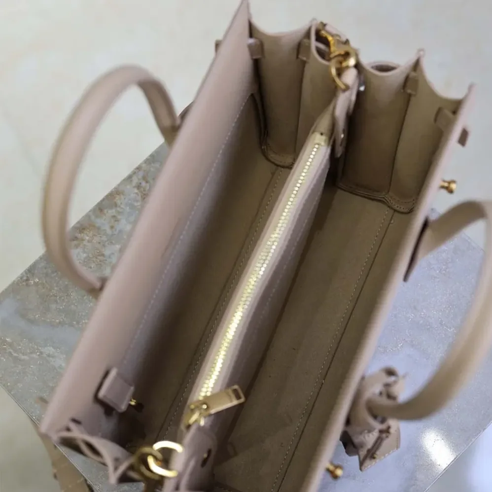 Saint Laurent YSL Baby Sac De Jour In Supple Grained Leather for Women in Beige