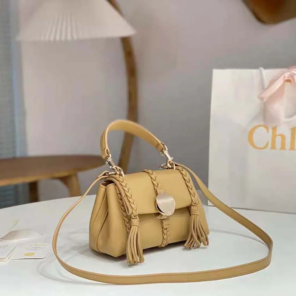 Chloé Penelope Mini Soft Shoulder Bag for Women in Brown