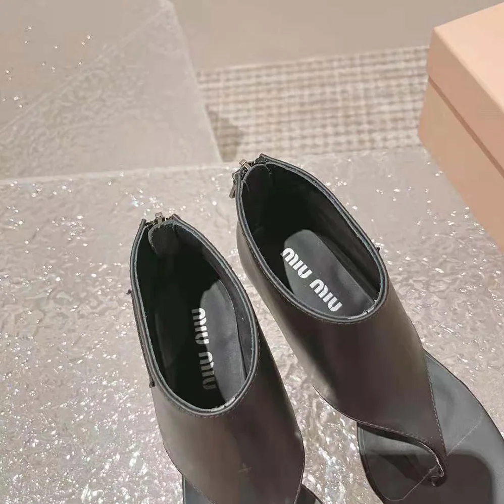 Miu Miu Leather Thong Booties for Women in Black