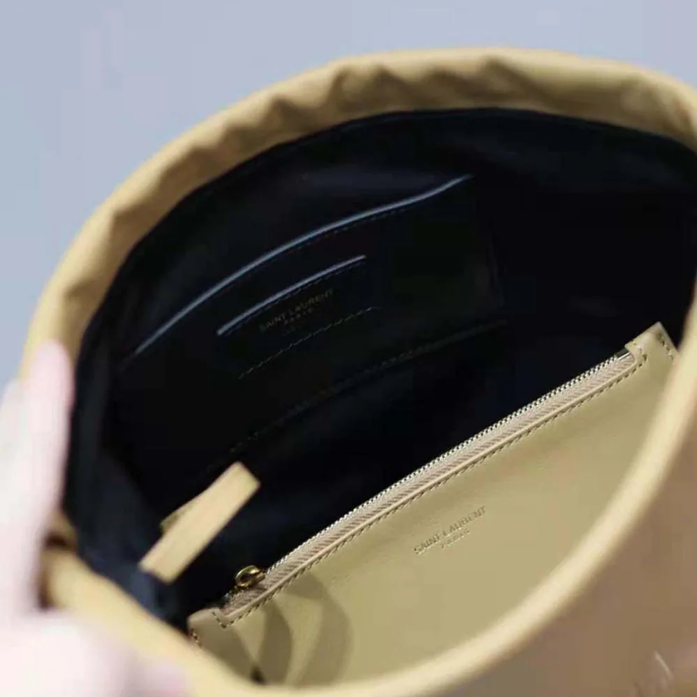 Saint Laurent YSL Rive Gauche Laced Bucket Bag in Smooth Leather for Men in Brown