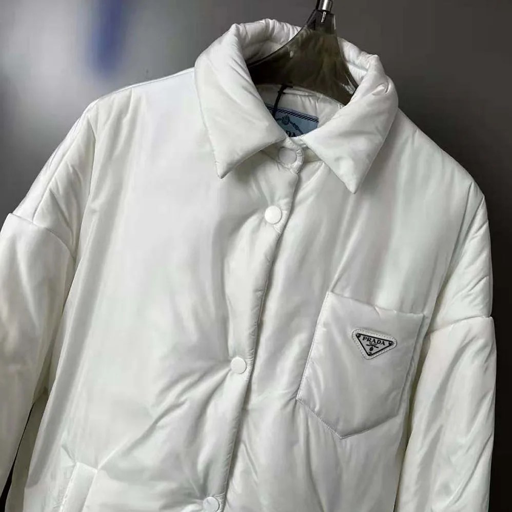 Prada Light Re-Nylon Padded Jacket for Women in White Prada Light Re-Nylon Padded Jacket for Women in White