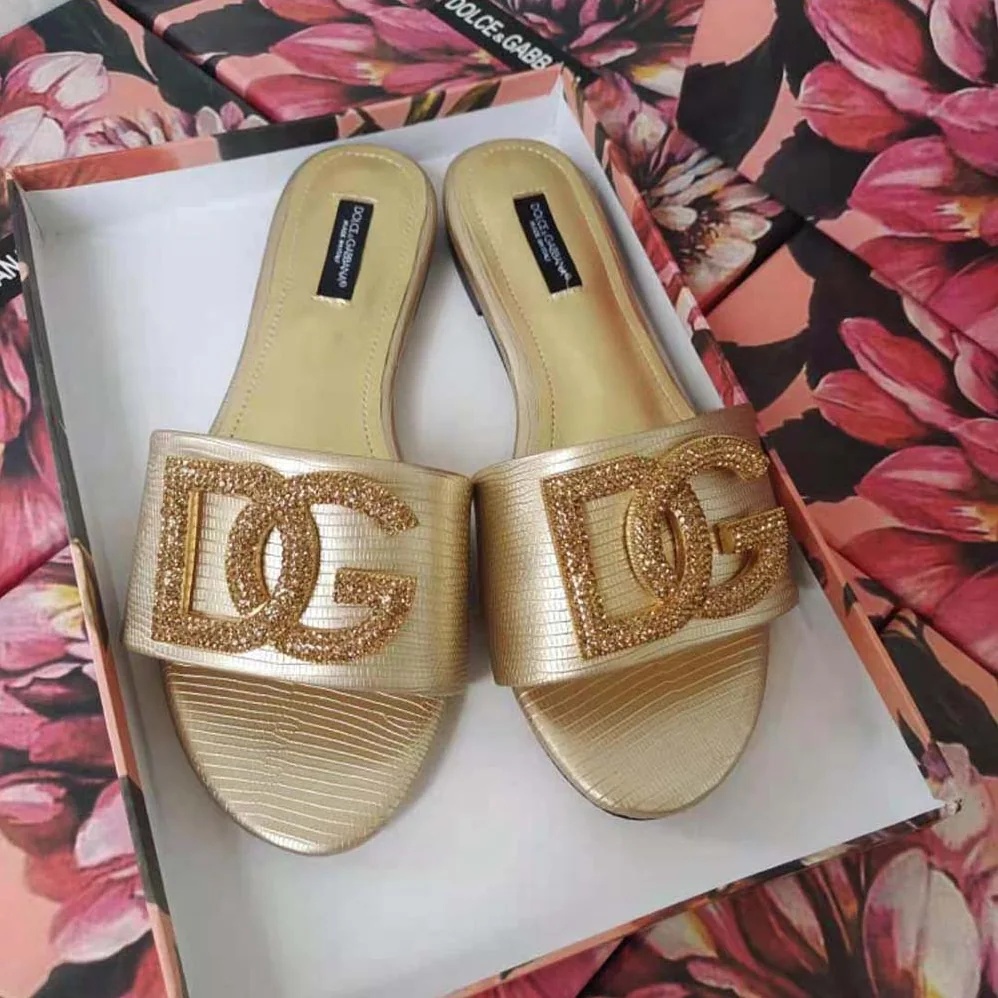 Dolce Gabbana D&G Foiled Iguana-Print Calfskin Slides with Rhinestone for Women in Detailed DG Logo Dolce Gabbana D&G Foiled Iguana-Print Calfskin Slides with Rhinestone for Women in Detailed DG Logo