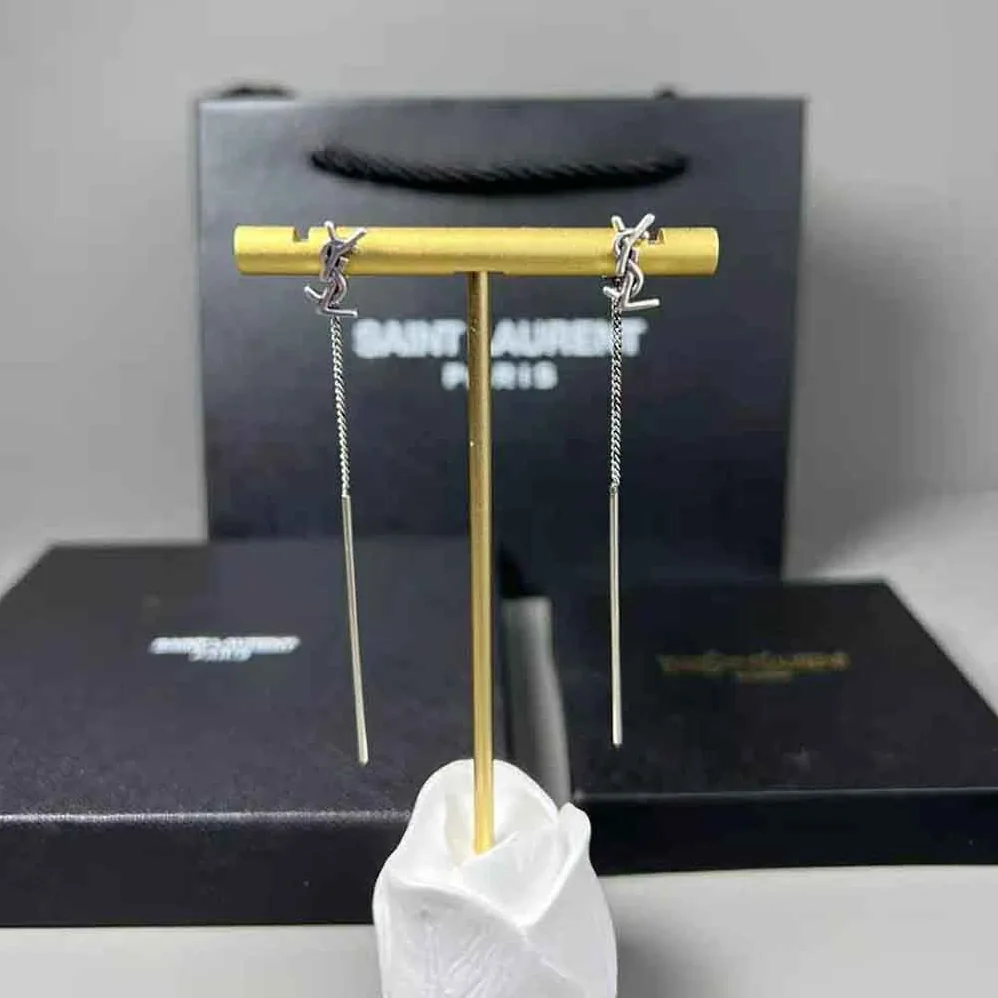 Saint Laurent YSL Opyum YSL Threader Earrings in Metal for Women in Silver