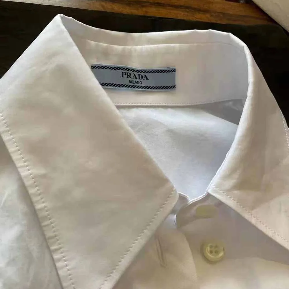 Prada Puffy Sleeve Poplin Blouse for Women in White Prada Puffy Sleeve Poplin Blouse for Women in White