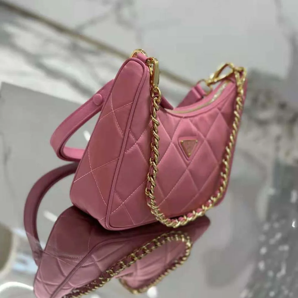 Prada Re-Edition 1995 Chaîne Re-Nylon Mini-bag for Women in Pink