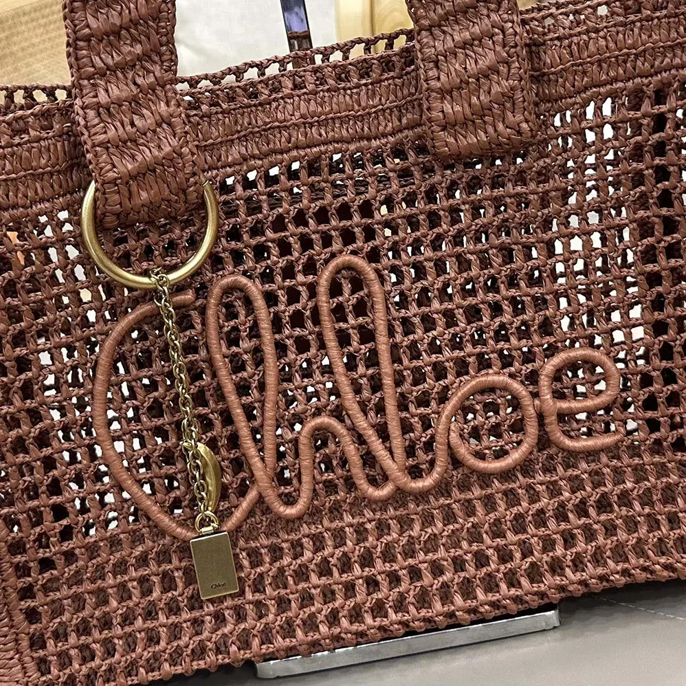 Chloe Summer Banana East-west Tote Bag in Raffia & Buffalo Leather for Women Chloe Summer Banana East-west Tote Bag in Raffia & Buffalo Leather for Women