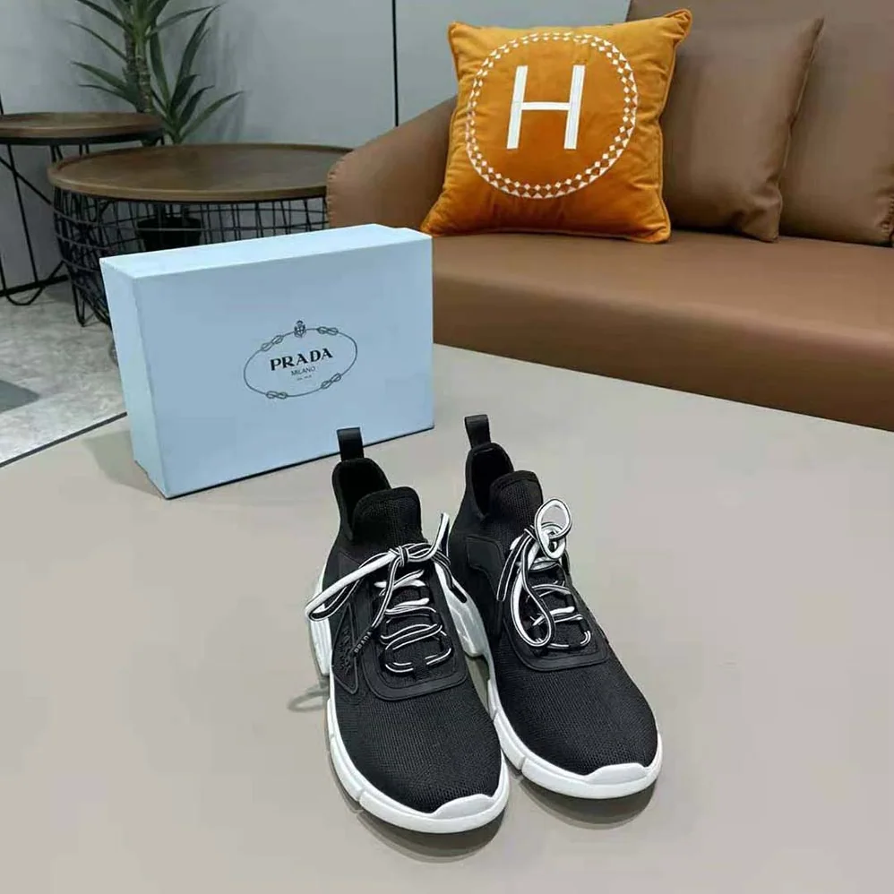 Prada The Triangle Logo Decorates These Knit Fabric Sneakers for Women in Black