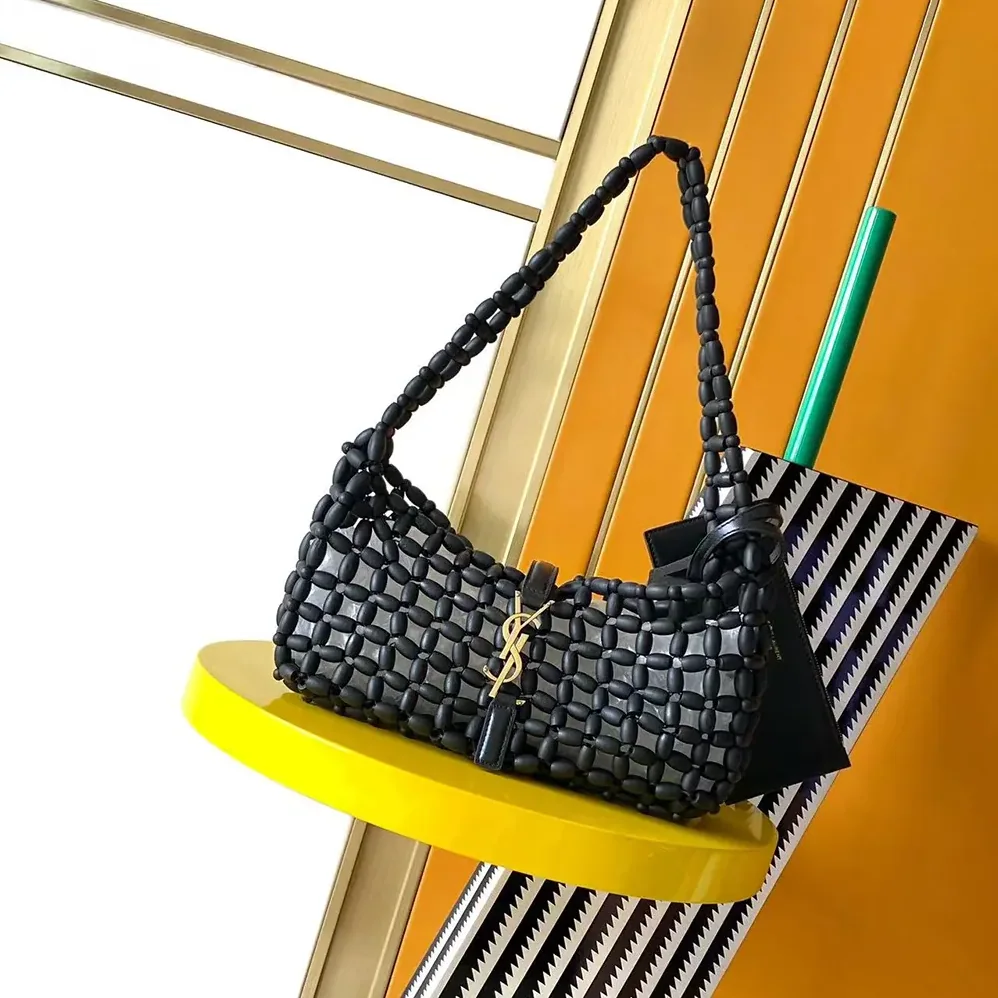 Saint Laurent YSL Le 5 À 7 In Wood Beads for Women in Black Saint Laurent YSL Le 5 À 7 In Wood Beads for Women in Black