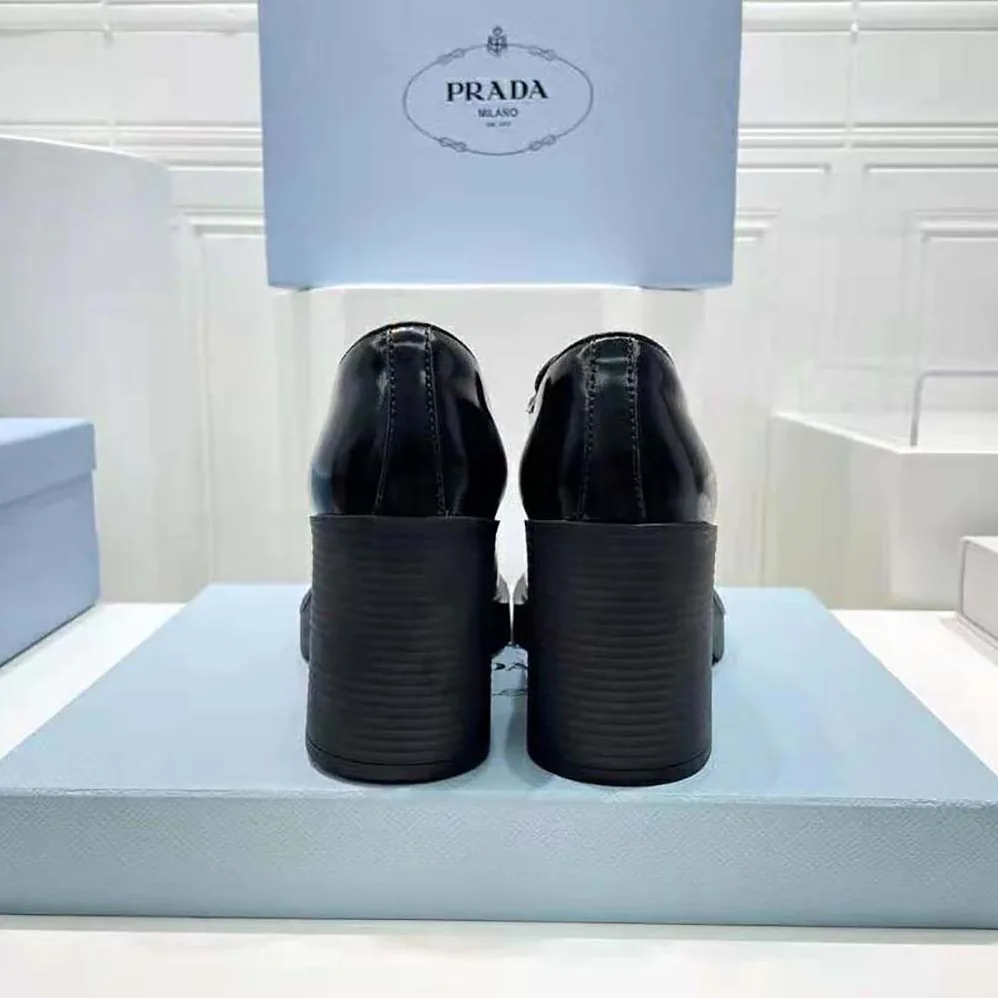 Prada Heeled Brushed Leather Lace-Ups for Women in Black Prada Heeled Brushed Leather Lace-Ups for Women in Black