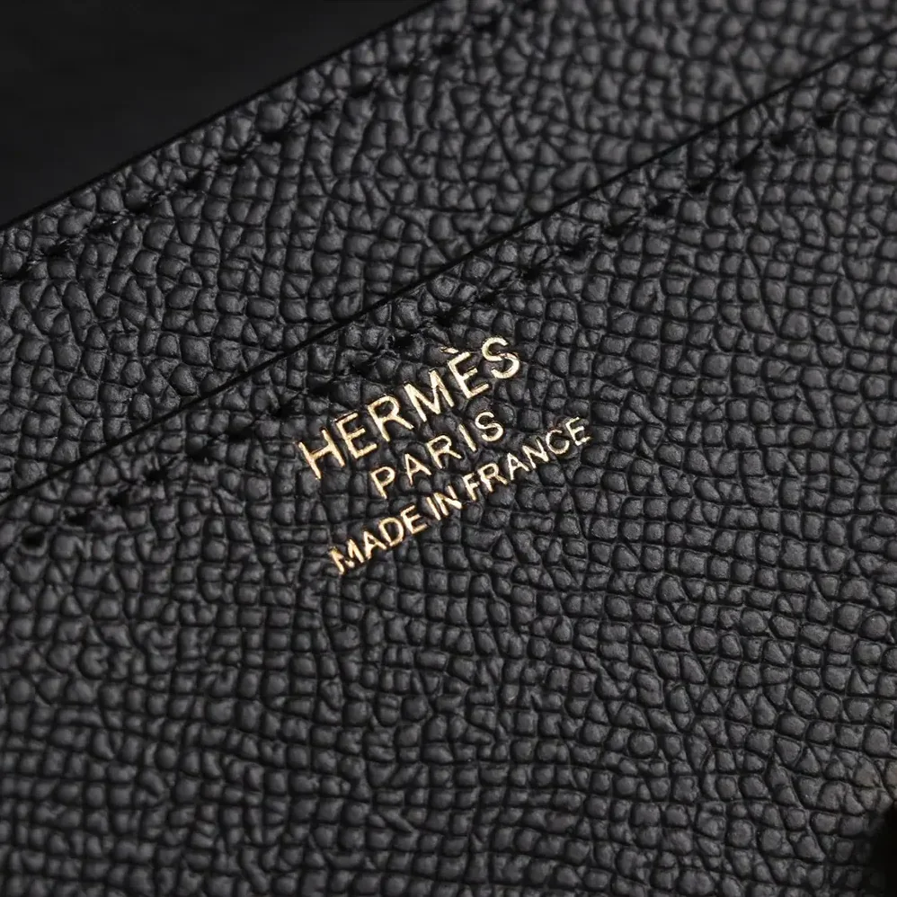 Hermes Constance Long To Go in Epsom Leather for Women in Black/Gold