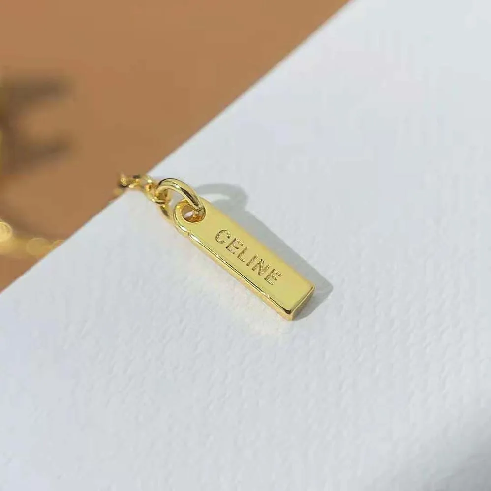 Celine Triomphe Sliding Earrings in Brass with Gold Finish for Women