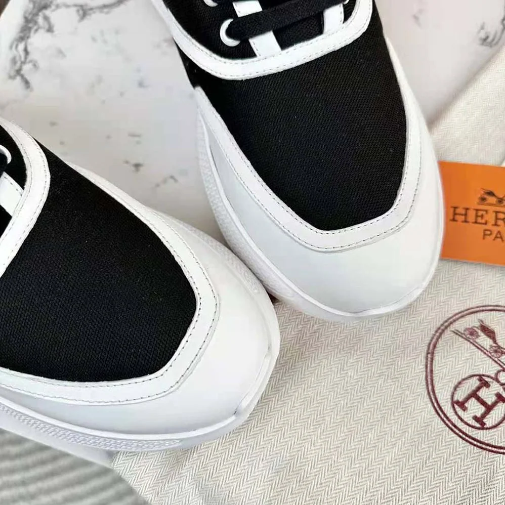 Hermes Giga Sneaker in Mesh Pique and Calfskin for Women in Black Hermes Giga Sneaker in Mesh Pique and Calfskin for Women in Black