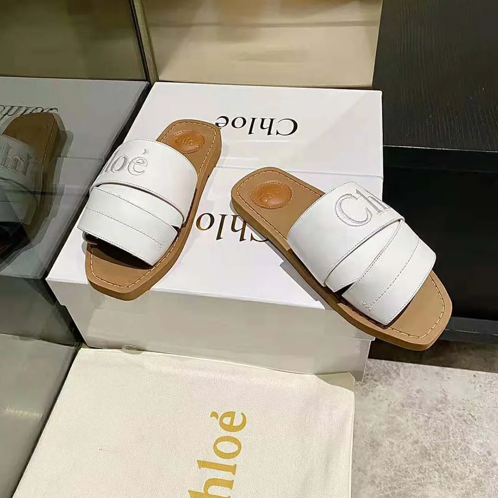Chloe Woody Flat Mule for Women in White Chloe Woody Flat Mule for Women in White