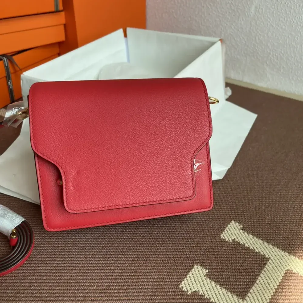 Hermes Roulis Mini Bag in Evercolor Calfskin for Women in Red/Gold
