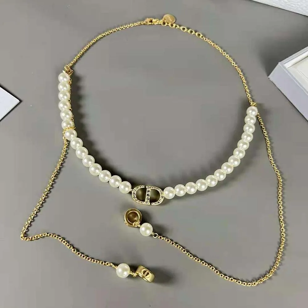 Dior Petit CD Necklace for Headphones Gold for Women in Finish Metal Dior Petit CD Necklace for Headphones Gold for Women in Finish Metal