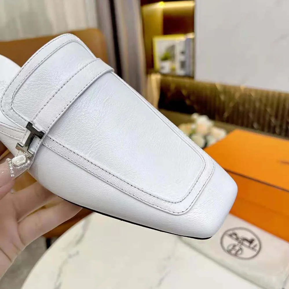 Hermes Groupie Mule in Goatskin with Miniature Palladium-Plated Paris Buckle for Women in White