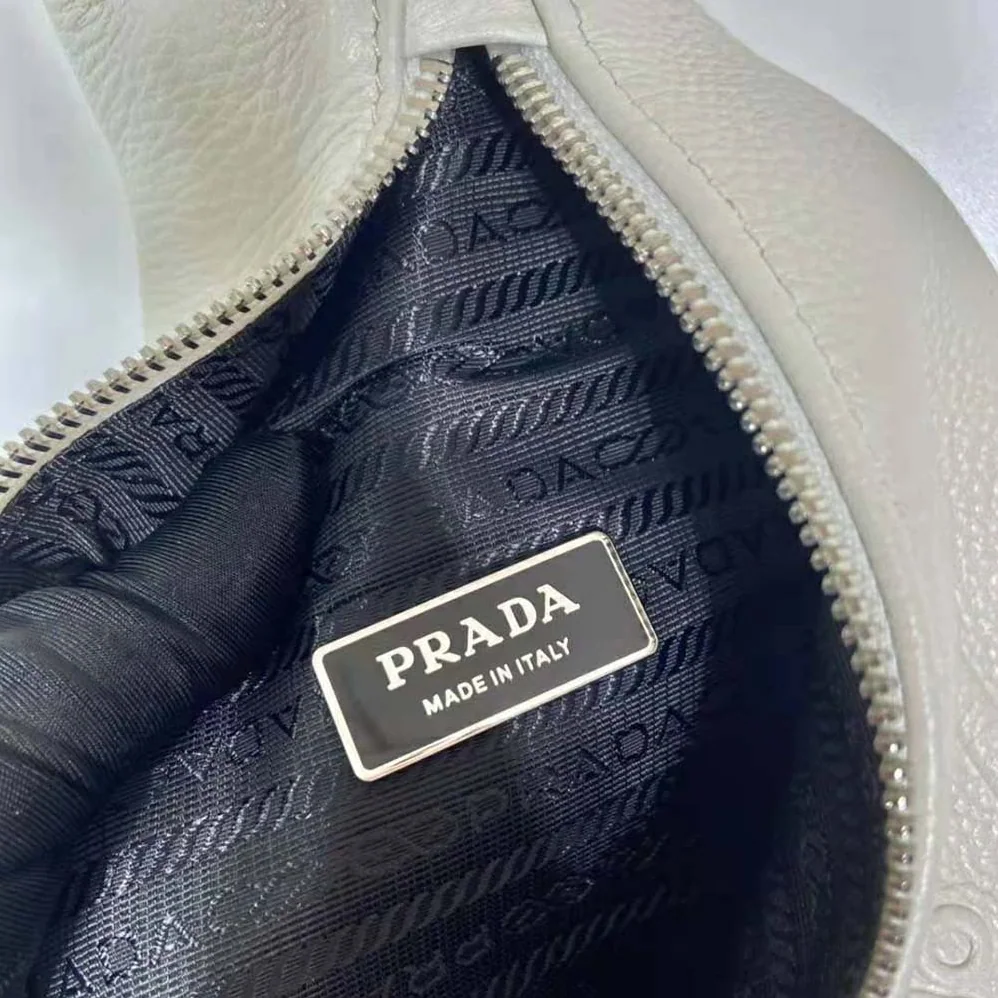 Prada Cross Leather Bag wite Logo-Print Re-Nylon lining for Men in White Prada Cross Leather Bag wite Logo-Print Re-Nylon lining for Men in White