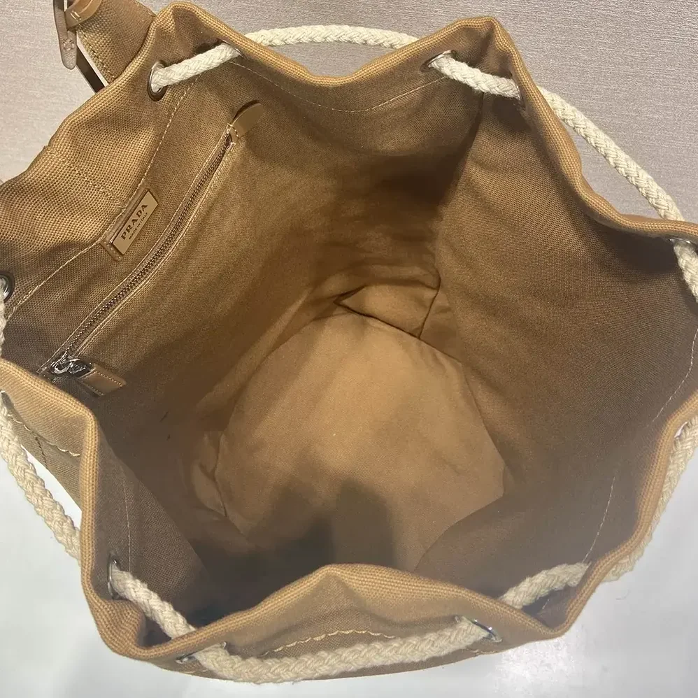 Prada Canvas Drawstring Duffle Bag for Unisex in Brown
