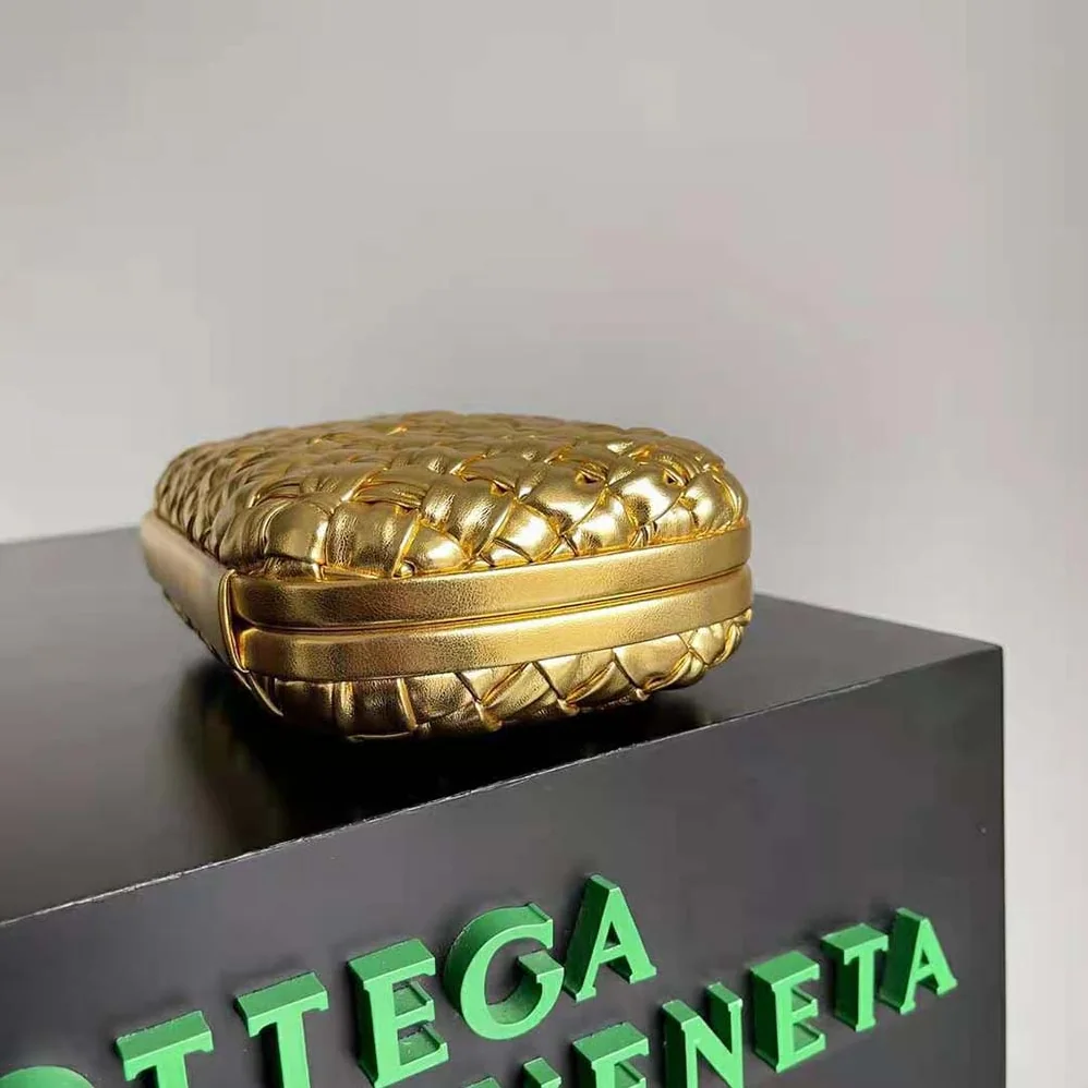 Bottega Veneta Knot Pressed Intreccio Laminated Leather Minaudiere for Women in Gold