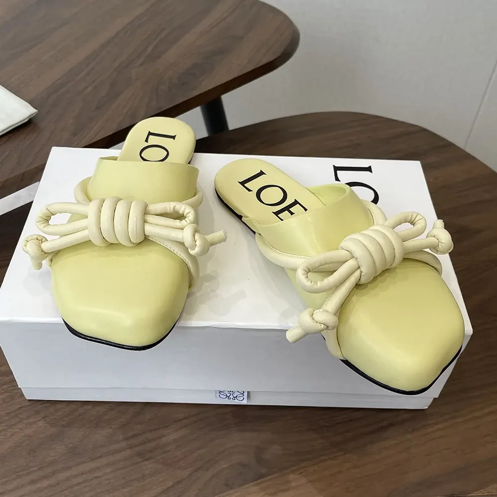 Loewe Flamenco Knot Mule in Lambskin for Women in Yellow Loewe Flamenco Knot Mule in Lambskin for Women in Yellow